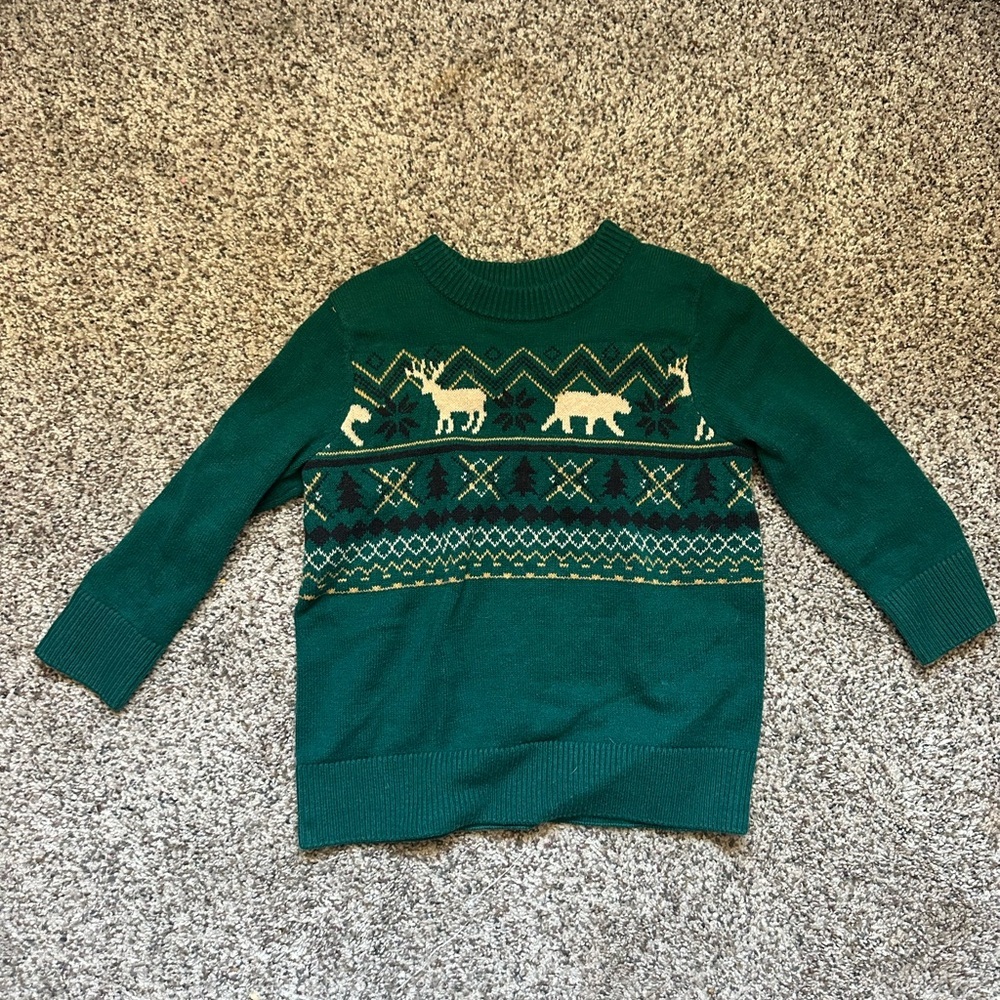 Green Sweater with Reindeer Pattern